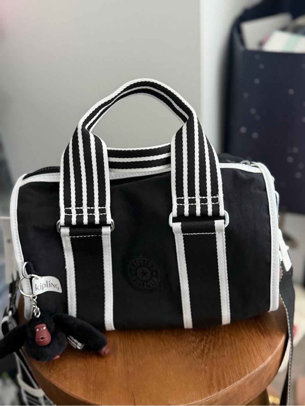 Kipling Black Bag with White Trim and Striped Handles